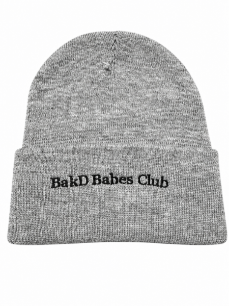 Complete your look with the BakD Babes Club Beanie Cap, perfect for tanning professionals and fans of the BakD Sunless brand.