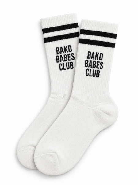 Complete your everyday look with BakD Babes Club Socks, perfect for tanning professionals and fans of the BakD Sunless brand.